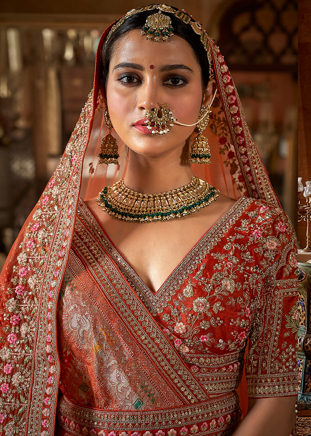 Buy Now Orange Bridal Silk Sabyasachi Inspired Lehenga Choli Online in US, UK, Canada, France, Italy, Germany, Austria, Denmark, UAE & Worldwide at Empress.