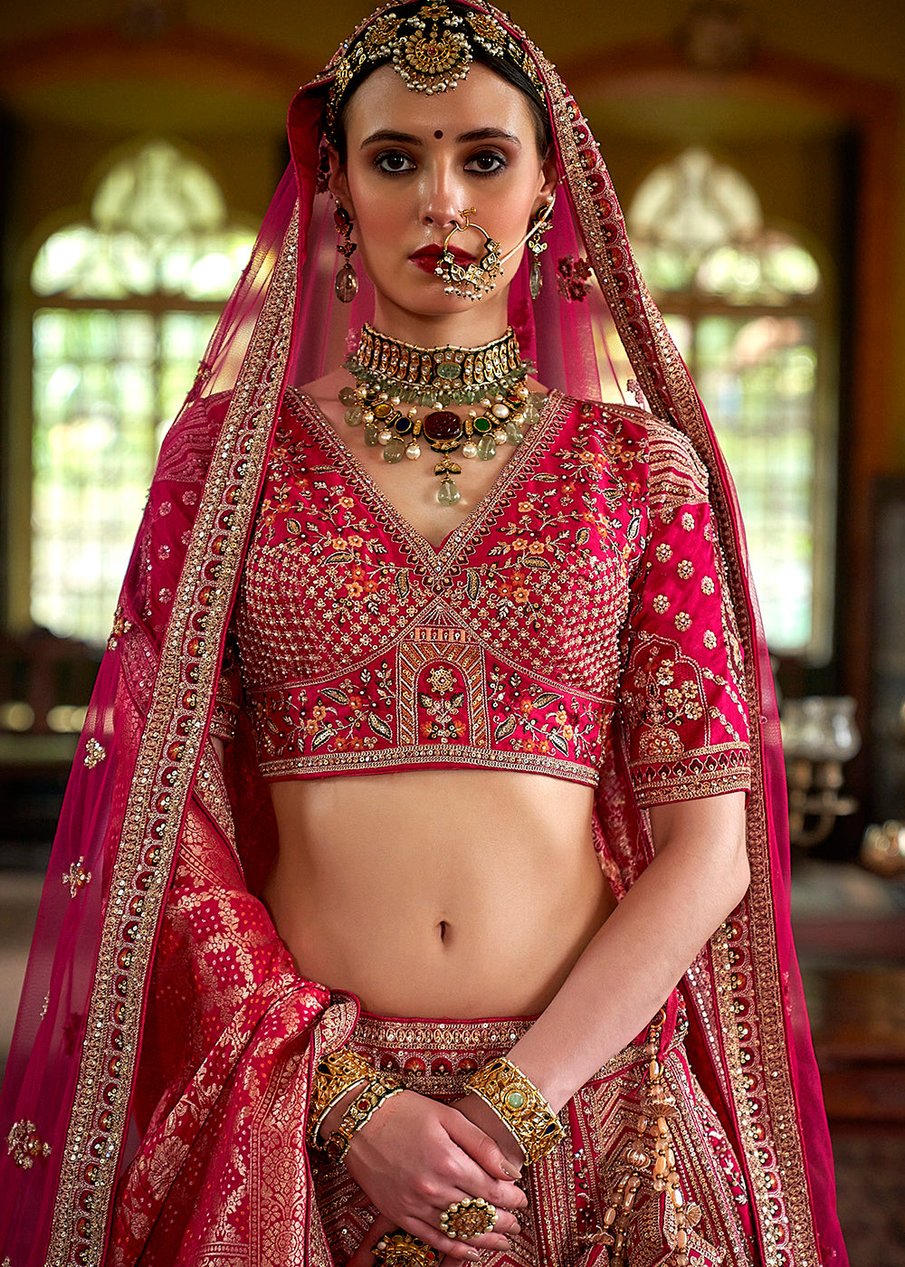 Buy Now Rani Pink Silk Heavily Embroidered Bridal Lehenga Choli Online in US, UK, Canada, France, Italy, Germany, Austria, Denmark, UAE & Worldwide at Empress.