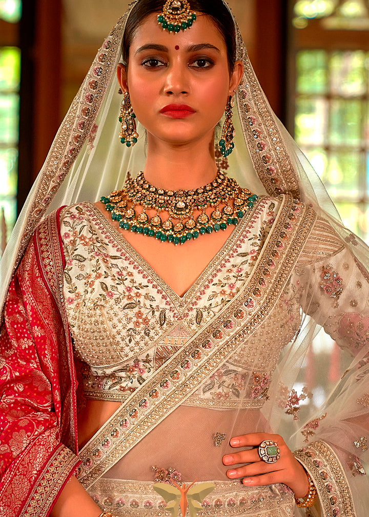 Buy Now Ivory Silk Heavily Embroidered Bridal Lehenga Choli Online in US, UK, Canada, France, Italy, Germany, Austria, Denmark, UAE & Worldwide at Empress.