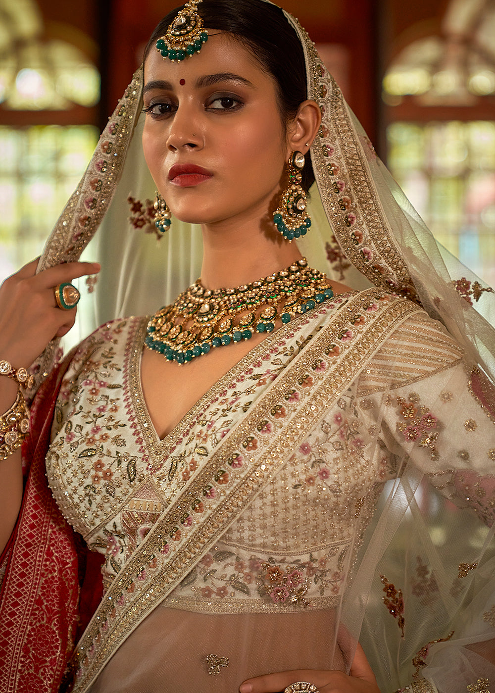 Buy Now Ivory Silk Heavily Embroidered Bridal Lehenga Choli Online in US, UK, Canada, France, Italy, Germany, Austria, Denmark, UAE & Worldwide at Empress.