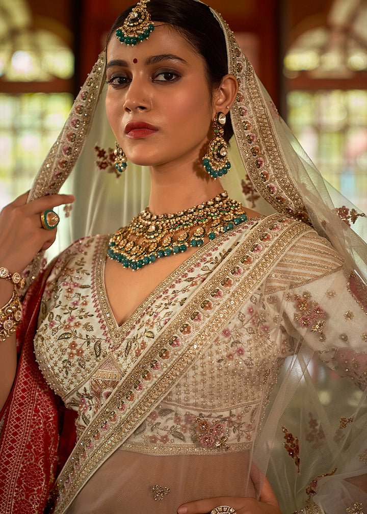Buy Now Ivory Silk Heavily Embroidered Bridal Lehenga Choli Online in US, UK, Canada, France, Italy, Germany, Austria, Denmark, UAE & Worldwide at Empress.