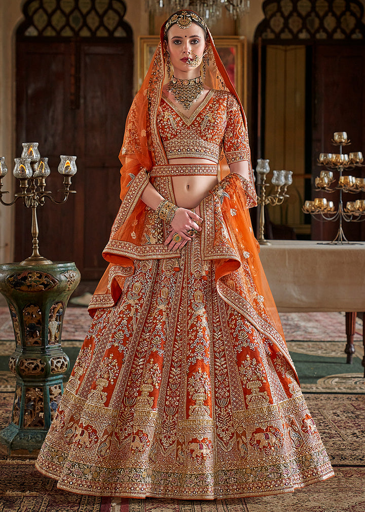 Buy Now Orange Pretty Bridal Tone Silk Designer Lehenga Choli Online in US, UK, Canada, France, Italy, Germany, Austria, Denmark, UAE & Worldwide at Empress.