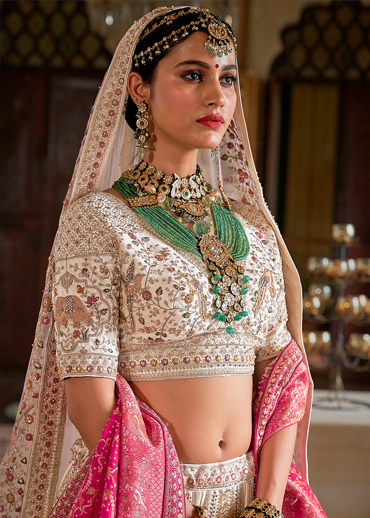 Buy Now Cream Pretty Bridal Tone Silk Designer Lehenga Choli Online in US, UK, Canada, France, Italy, Germany, Austria, Denmark, UAE & Worldwide at Empress.