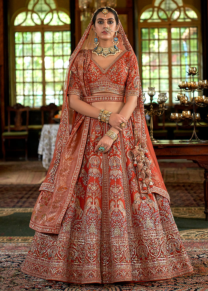 Buy Now Pretty Orange Bridal Tone Silk Designer Lehenga Choli Online in US, UK, Canada, France, Italy, Germany, Austria, Denmark, UAE & Worldwide at Empress.