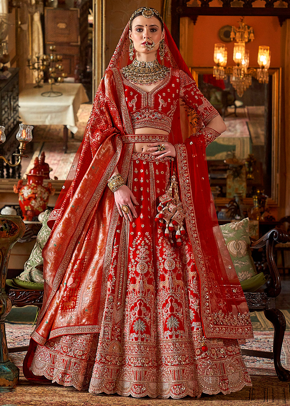 Buy Now Hot Red Silk Heavily Embroidered Bridal Lehenga Choli Online in US, UK, Canada, France, Italy, Germany, Austria, Denmark, UAE & Worldwide at Empress.