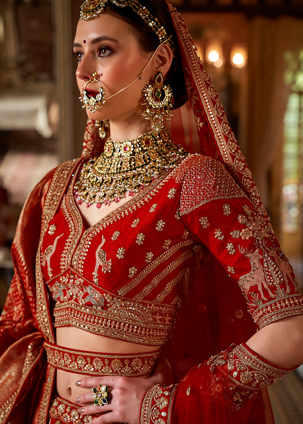 Buy Now Hot Red Silk Heavily Embroidered Bridal Lehenga Choli Online in US, UK, Canada, France, Italy, Germany, Austria, Denmark, UAE & Worldwide at Empress.