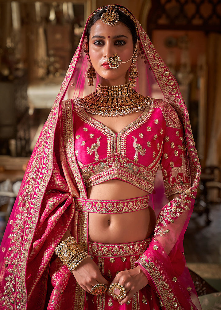 Buy Now Pink Silk Heavily Embroidered Bridal Lehenga Choli Online in US, UK, Canada, France, Italy, Germany, Austria, Denmark, UAE & Worldwide at Empress.