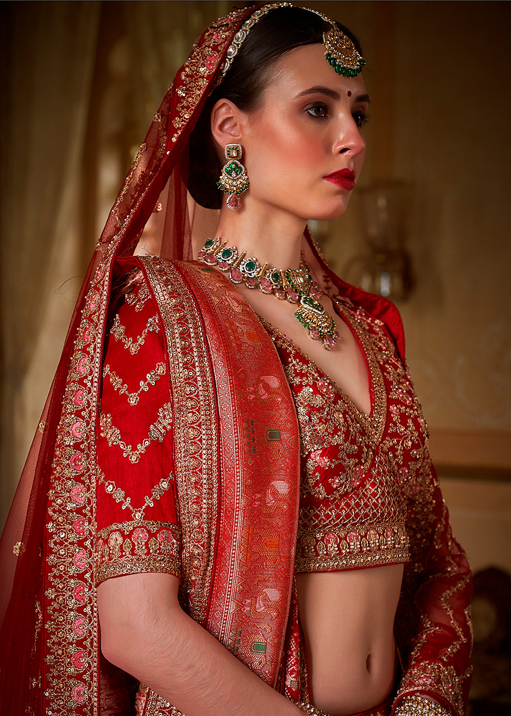 Buy Now Red Silk Heavily Embroidered Bridal Wear Lehenga Choli Online in US, UK, Canada, France, Italy, Germany, Austria, Denmark, UAE & Worldwide at Empress.
