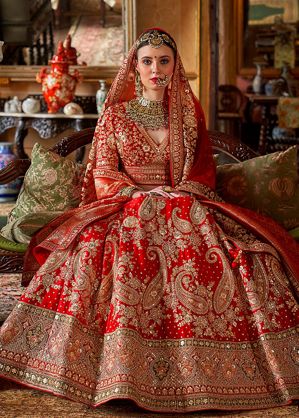 Buy Now Hot Red Silk Heavily Embroidered Bridal Wear Lehenga Choli Online in US, UK, Canada, France, Italy, Germany, Austria, Denmark & Worldwide at Empress.