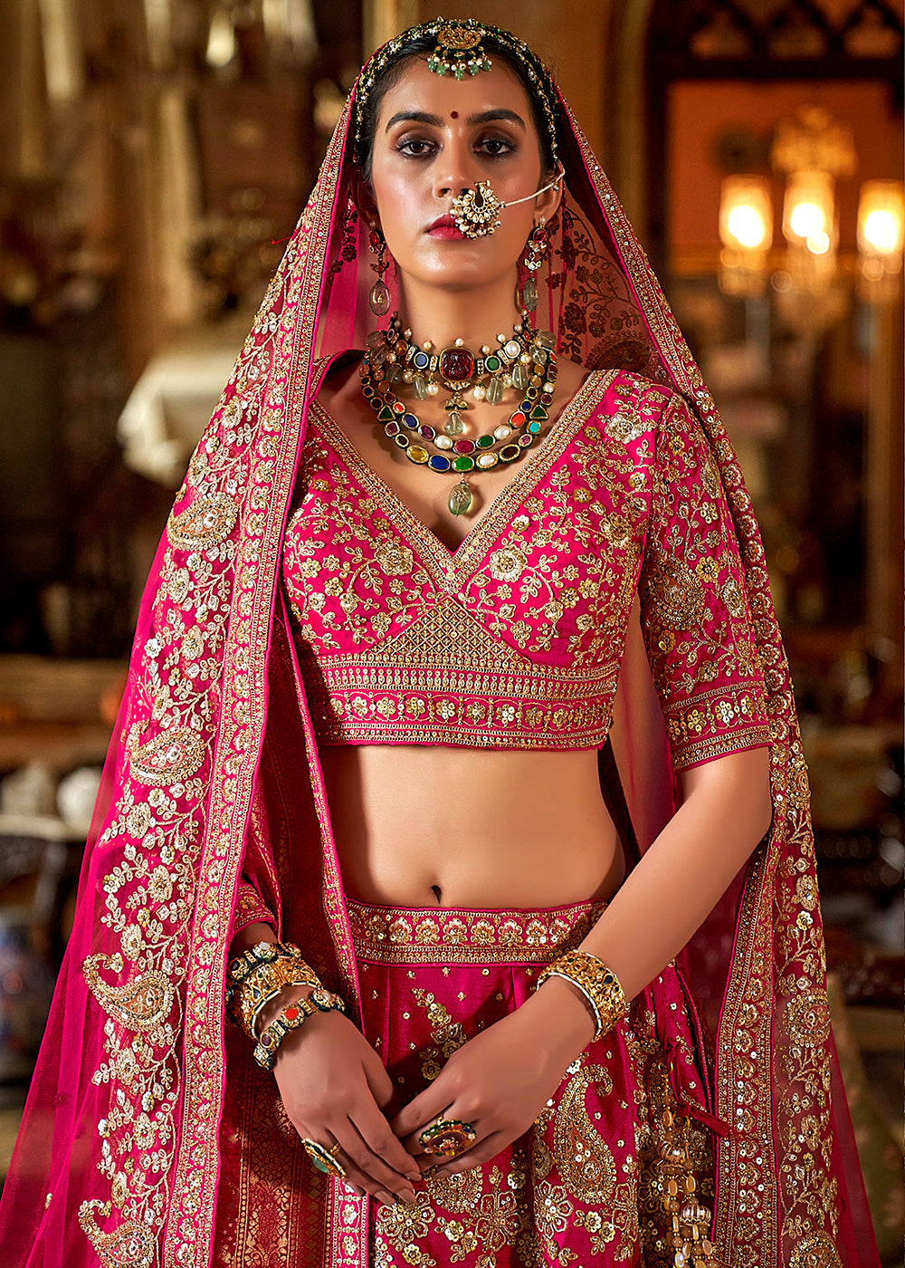 Buy Now Rani Pink Silk Heavily Embroidered Bridal Wear Lehenga Choli Online in US, UK, Canada, France, Italy, Germany, Austria, Denmark & Worldwide at Empress.