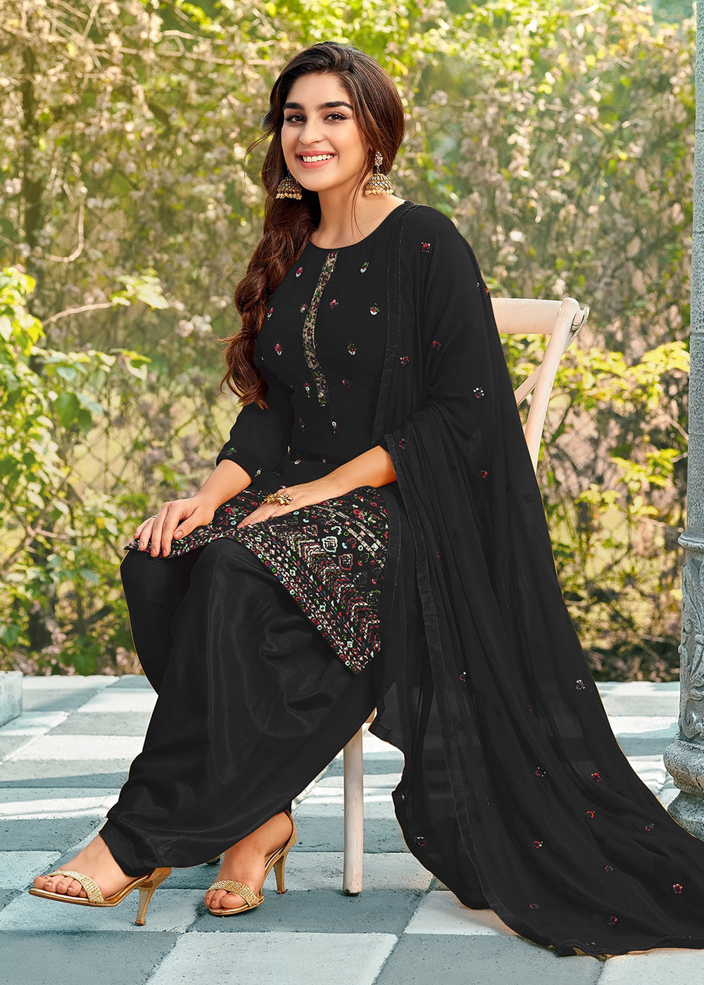 Buy Now Riveting Black Punjabi Style Embroidered Georgette Patiala Suit Online in USA, UK, Canada, Germany, Australia & Worldwide at Empress Clothing.