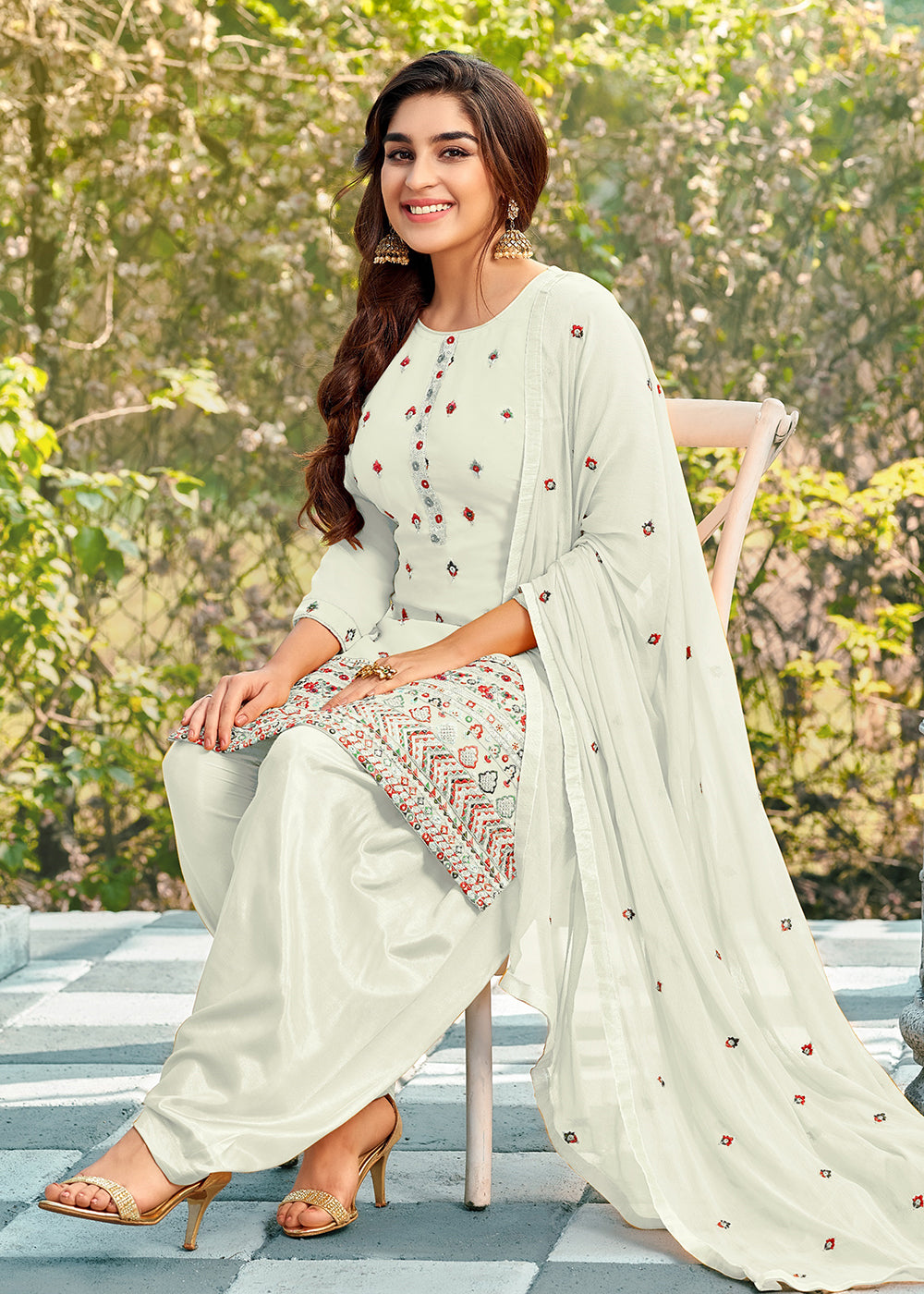 Buy Now Riveting White Punjabi Style Embroidered Georgette Patiala Suit Online in USA, UK, Canada, Germany, Australia & Worldwide at Empress Clothing.