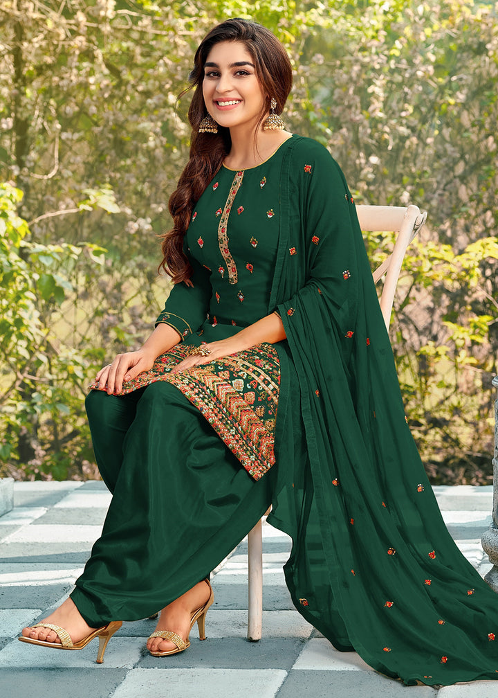 Buy Now Riveting Green Punjabi Style Embroidered Georgette Patiala Suit Online in USA, UK, Canada, Germany, Australia & Worldwide at Empress Clothing.