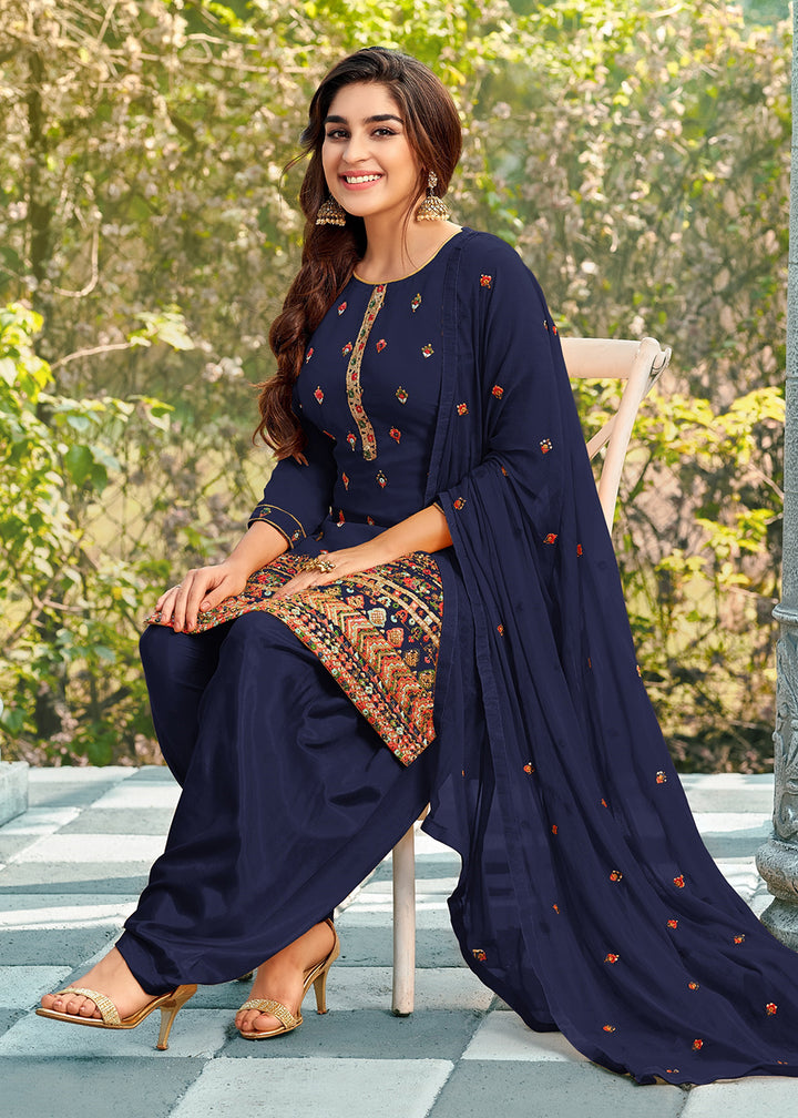 Buy Now Riveting Blue Punjabi Style Embroidered Georgette Patiala Suit Online in USA, UK, Canada, Germany, Australia & Worldwide at Empress Clothing. 