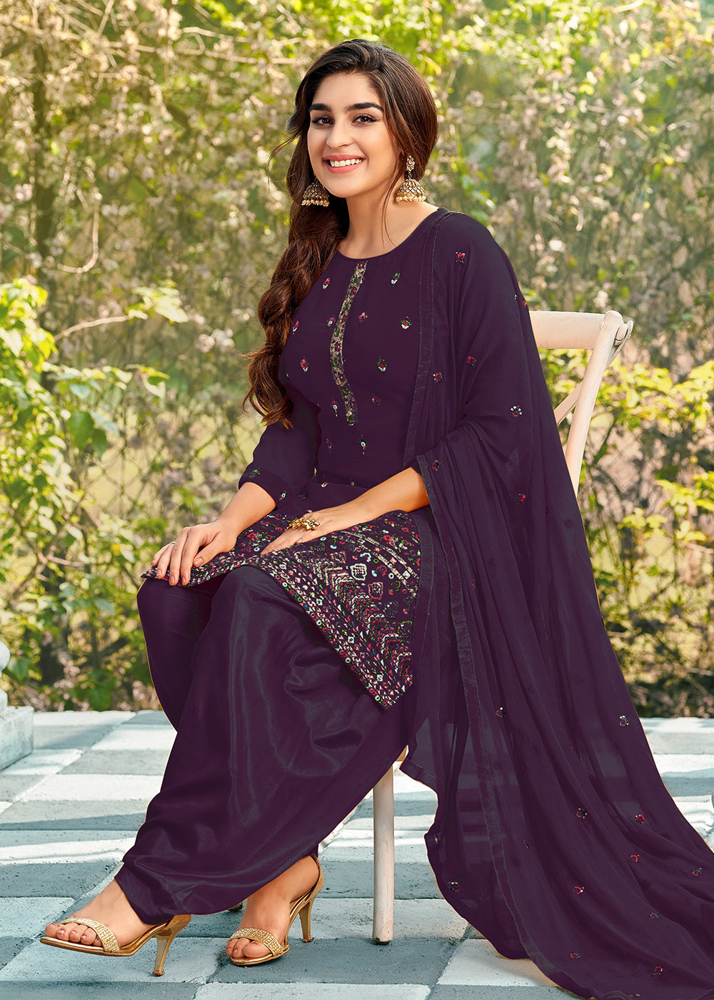 Buy Now Riveting Purple Punjabi Style Embroidered Georgette Patiala Suit Online in USA, UK, Canada, Germany, Australia & Worldwide at Empress Clothing. 