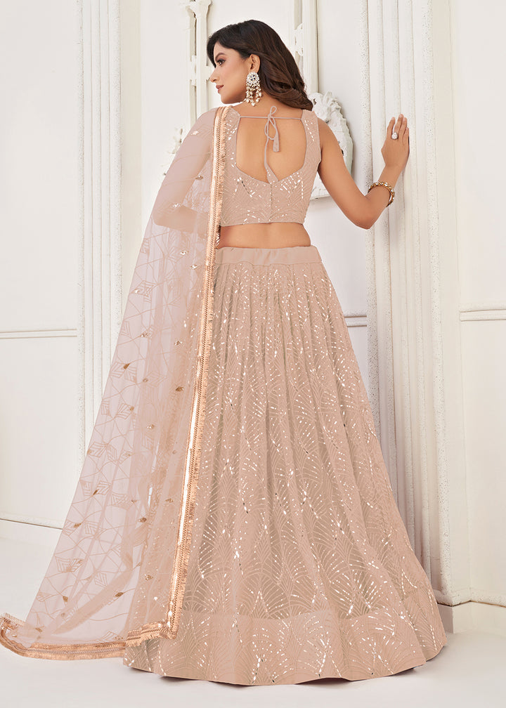 Buy Now Embroidered Net Peach Sangeet & Wedding Lehenga Choli Online in USA, UK, Canada, France, Italy, Greece, UAE, Sweden & Worldwide at Empress Clothing.