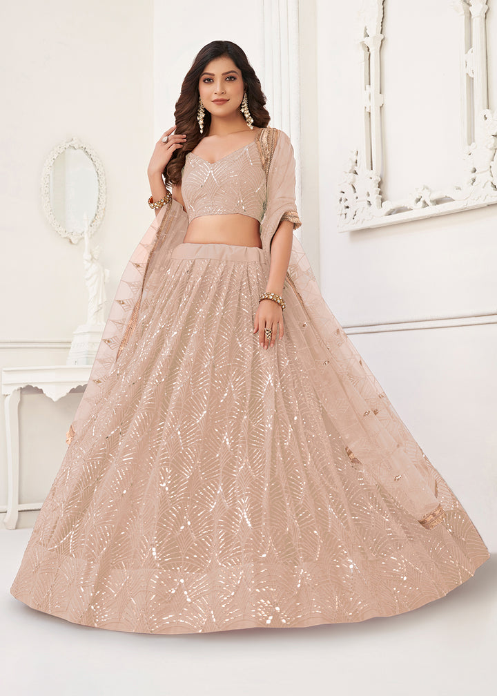 Buy Now Embroidered Net Peach Sangeet & Wedding Lehenga Choli Online in USA, UK, Canada, France, Italy, Greece, UAE, Sweden & Worldwide at Empress Clothing.