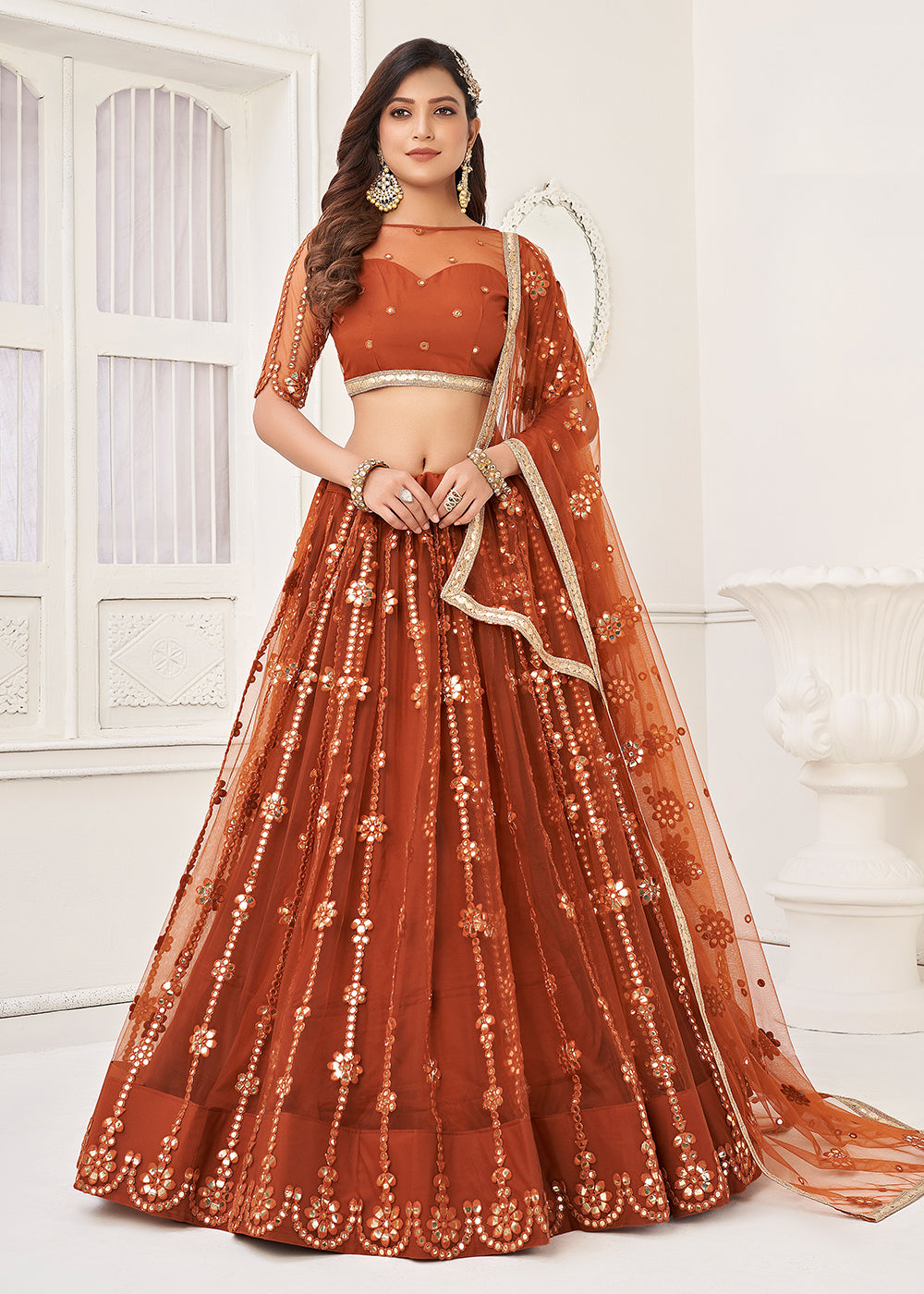 Buy Now Embroidered Net Rust Sangeet & Haldi Wedding Lehenga Choli Online in USA, UK, Canada & Worldwide at Empress Clothing.
