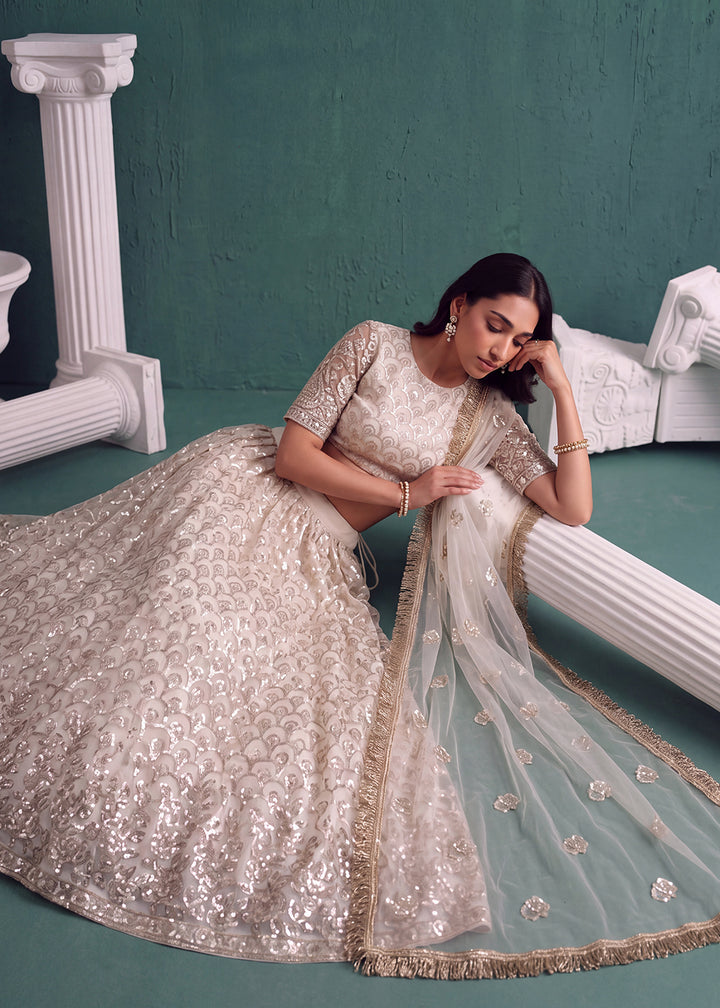Buy Now Lovable Off White Wedding Festive Net Lehenga Choli Online in US, UK, Canada, France, Italy, Germany, Sweden, Australia, Austria &amp; Worldwide at Empress.