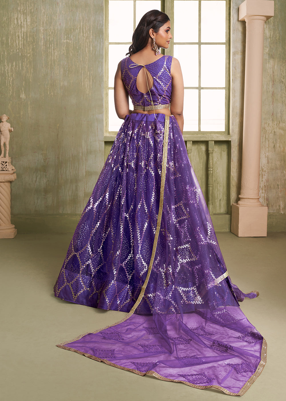 Buy Now Enchanting Purple Net Wedding Festive Lehenga Choli Online in USA, UK, Canada, France, Italy, Germany, Sweden, Denmark &amp; Worldwide at Empress Clothing.