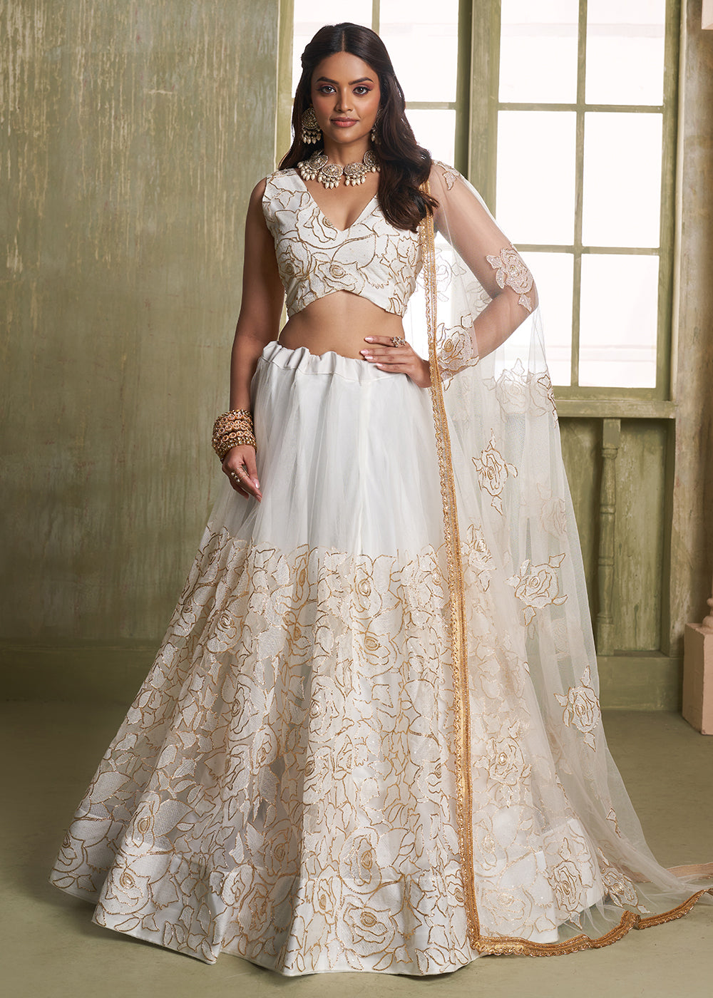 Buy Now Enchanting Off White Net Wedding Festive Lehenga Choli Online in USA, UK, Canada, France & Worldwide at Empress Clothing. 