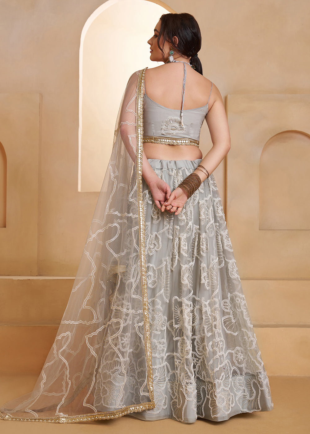 Buy Now Light Grey Beats Embroidery Designer Lehenga Choli Online in US, UK, France, Swiss, Netherlands, Germany, Italy, Canada, UAE & Worldwide at Empress.