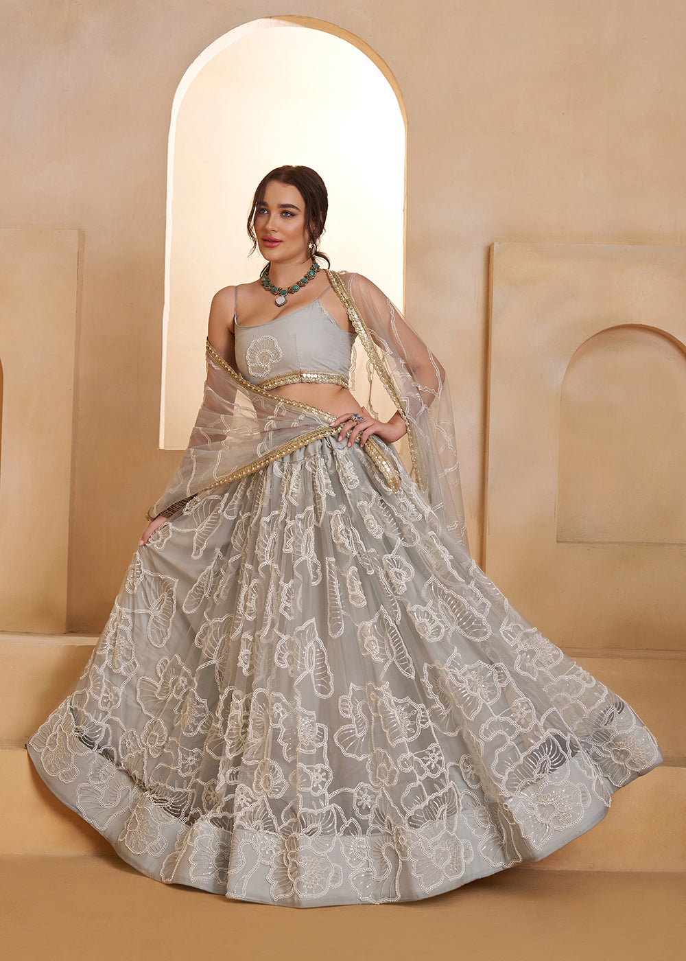 Buy Now Light Grey Beats Embroidery Designer Lehenga Choli Online in US, UK, France, Swiss, Netherlands, Germany, Italy, Canada, UAE & Worldwide at Empress.