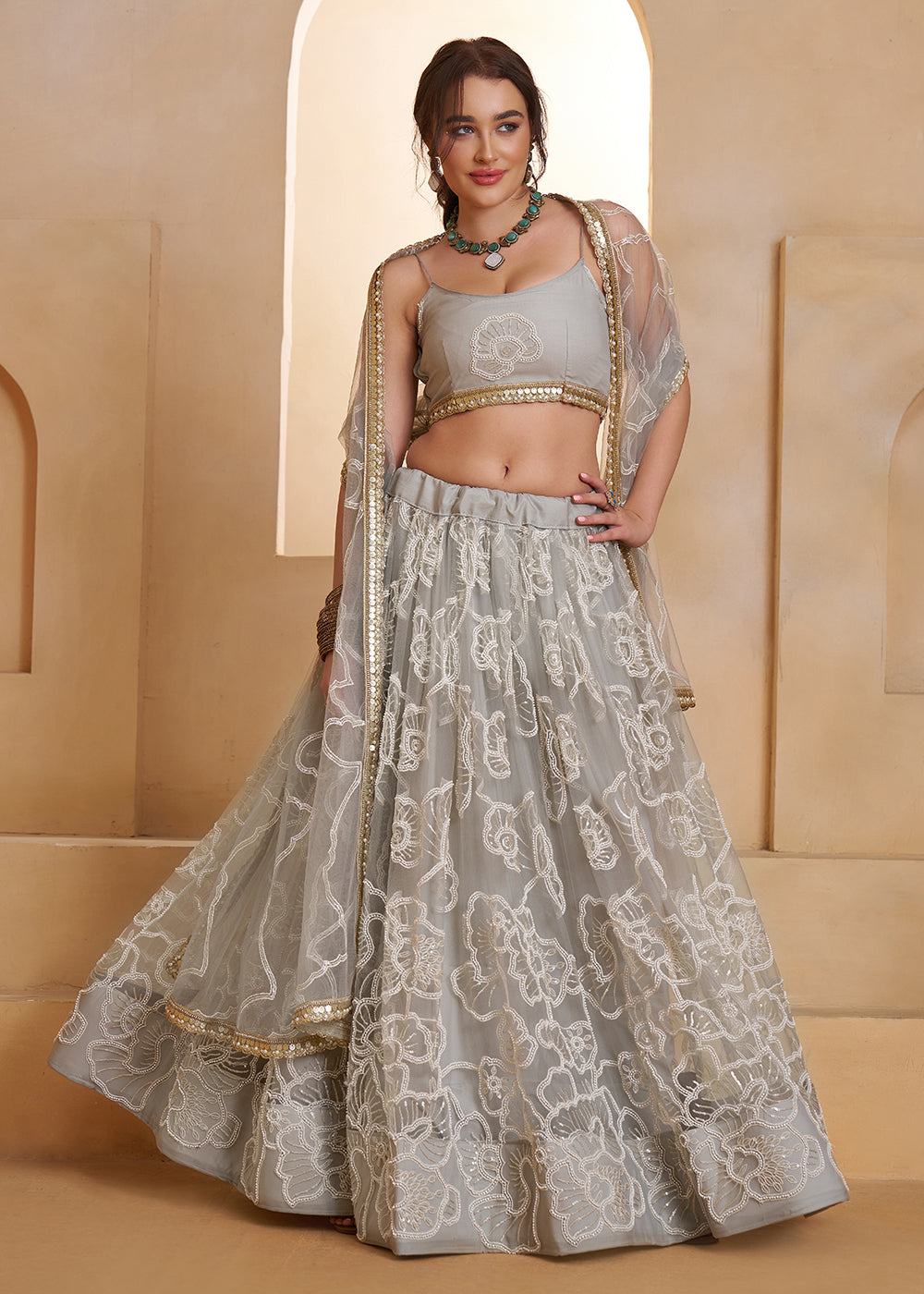 Buy Now Light Grey Beats Embroidery Designer Lehenga Choli Online in US, UK, France, Swiss, Netherlands, Germany, Italy, Canada, UAE & Worldwide at Empress.
