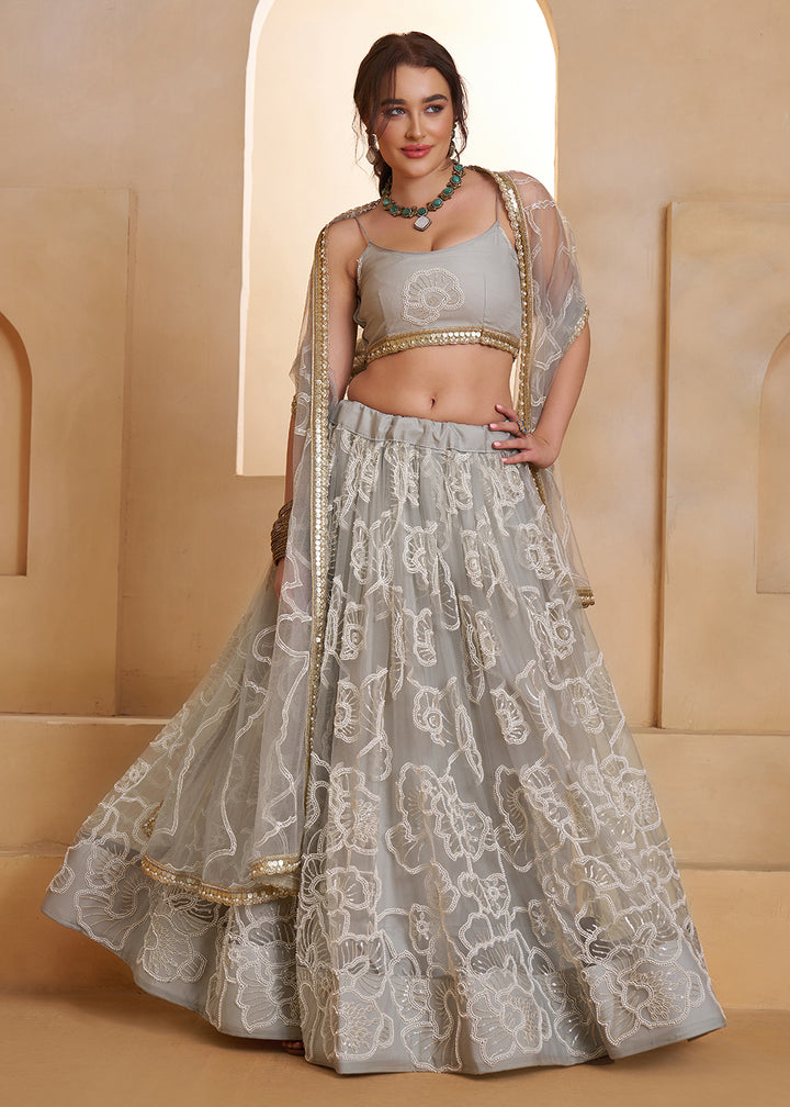 Buy Now Light Grey Beats Embroidery Designer Lehenga Choli Online in US, UK, France, Swiss, Netherlands, Germany, Italy, Canada, UAE & Worldwide at Empress.
