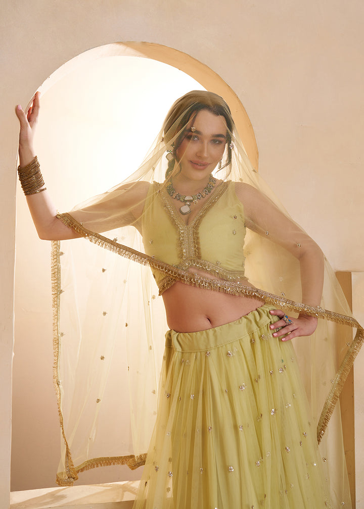 Buy Now Lemon Yellow Beats Embroidery Designer Lehenga Choli Online in US, UK, France, Swiss, Netherlands, Germany, Italy, Canada, UAE & Worldwide at Empress.
