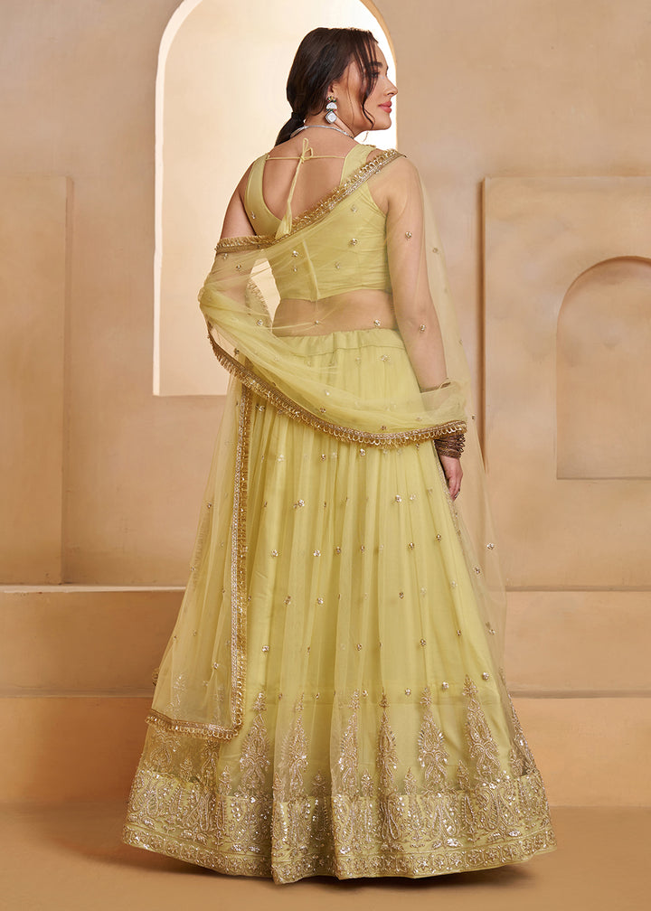 Buy Now Lemon Yellow Beats Embroidery Designer Lehenga Choli Online in US, UK, France, Swiss, Netherlands, Germany, Italy, Canada, UAE & Worldwide at Empress.