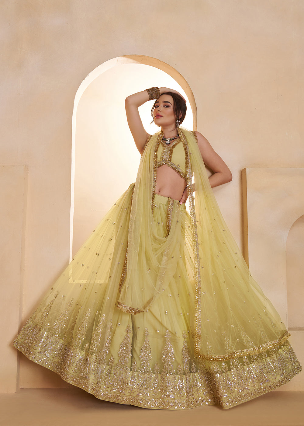 Buy Now Lemon Yellow Beats Embroidery Designer Lehenga Choli Online in US, UK, France, Swiss, Netherlands, Germany, Italy, Canada, UAE & Worldwide at Empress.