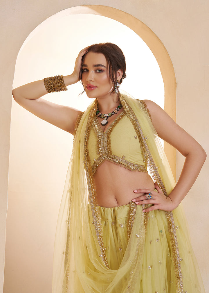 Buy Now Lemon Yellow Beats Embroidery Designer Lehenga Choli Online in US, UK, France, Swiss, Netherlands, Germany, Italy, Canada, UAE & Worldwide at Empress.