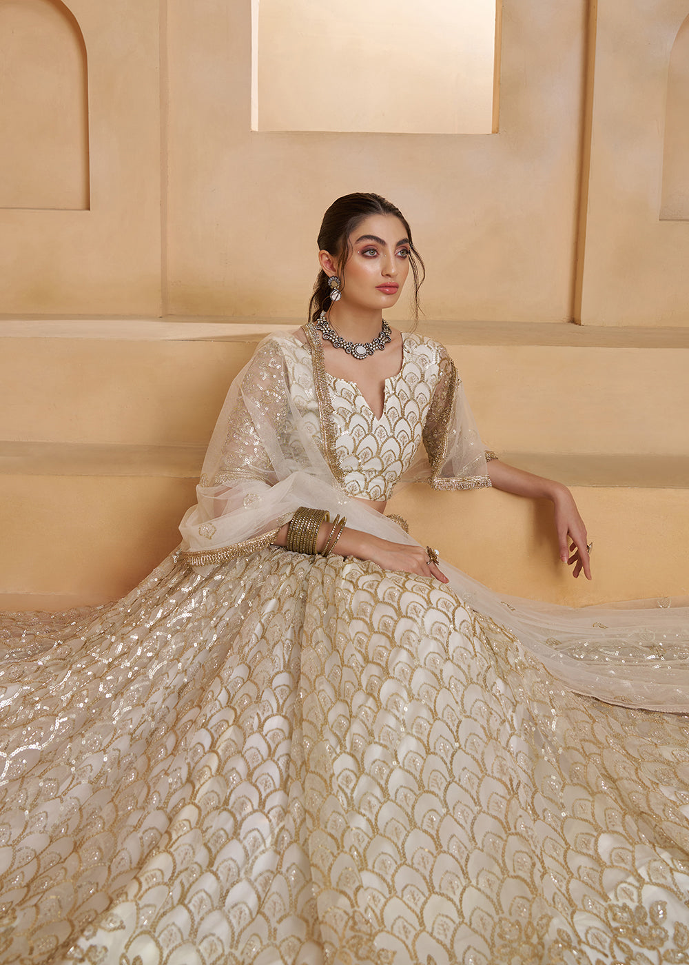 Buy Now Off White Beats Embroidery Designer Lehenga Choli Online in US, UK, France, Swiss, Netherlands, Germany, Italy, Canada, UAE & Worldwide at Empress.
