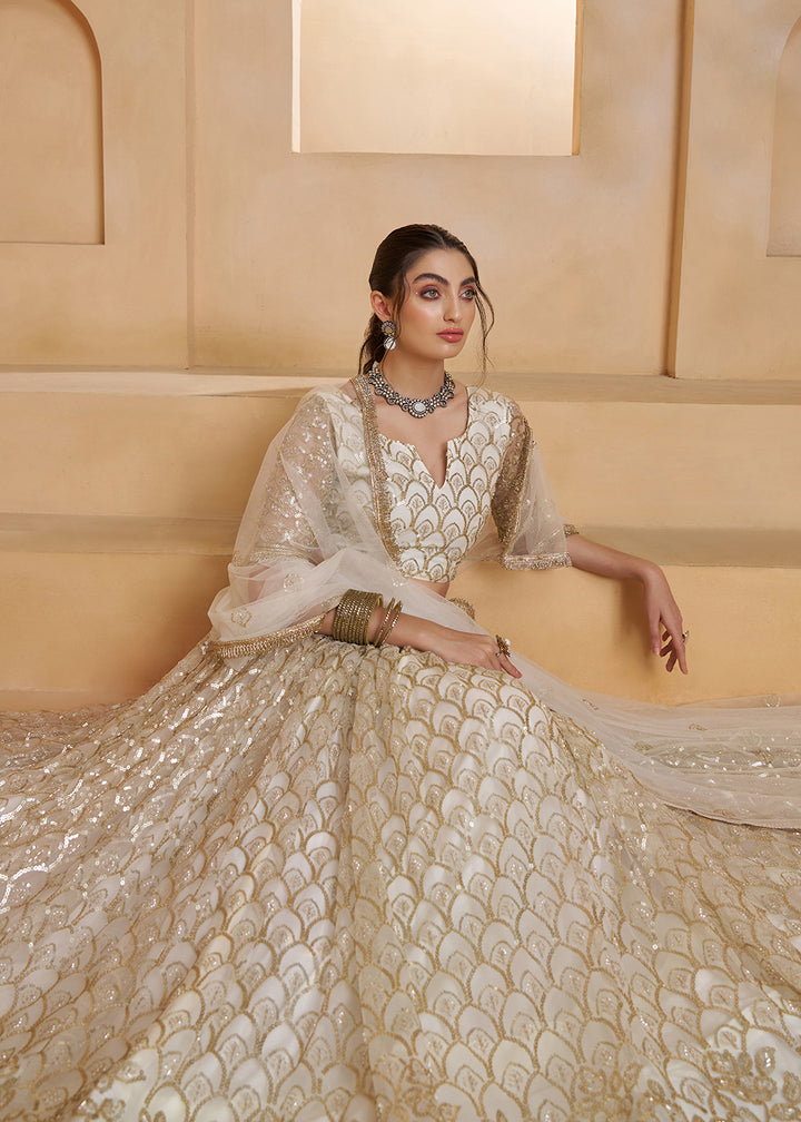 Buy Now Off White Beats Embroidery Designer Lehenga Choli Online in US, UK, France, Swiss, Netherlands, Germany, Italy, Canada, UAE & Worldwide at Empress.
