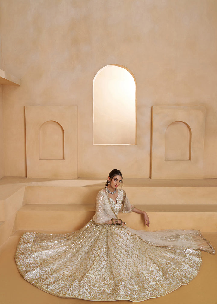 Buy Now Off White Beats Embroidery Designer Lehenga Choli Online in US, UK, France, Swiss, Netherlands, Germany, Italy, Canada, UAE & Worldwide at Empress.