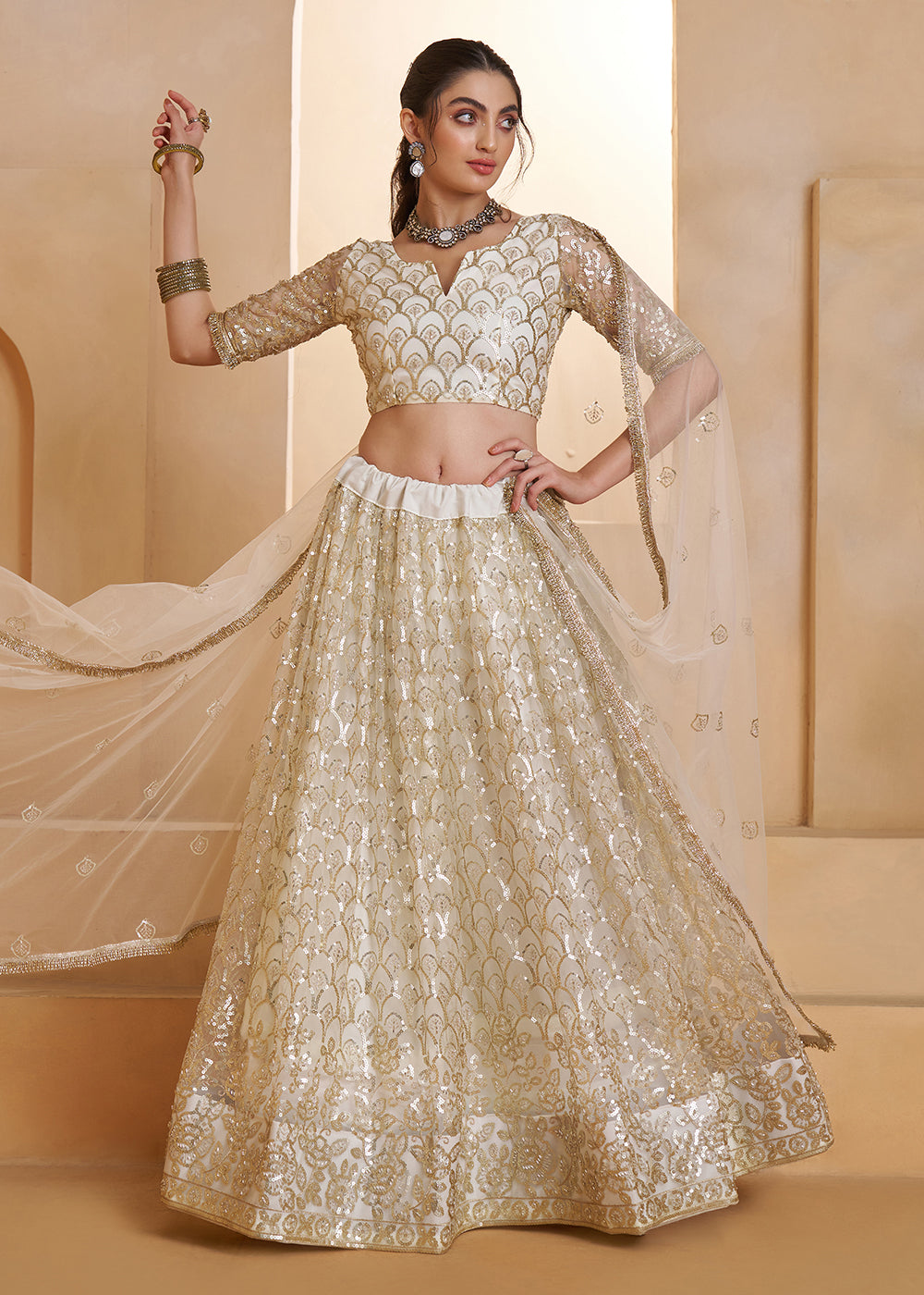 Buy Now Off White Beats Embroidery Designer Lehenga Choli Online in US, UK, France, Swiss, Netherlands, Germany, Italy, Canada, UAE & Worldwide at Empress.