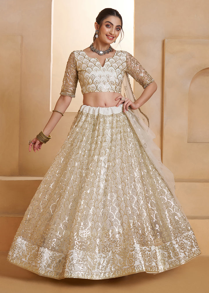 Buy Now Off White Beats Embroidery Designer Lehenga Choli Online in US, UK, France, Swiss, Netherlands, Germany, Italy, Canada, UAE & Worldwide at Empress.