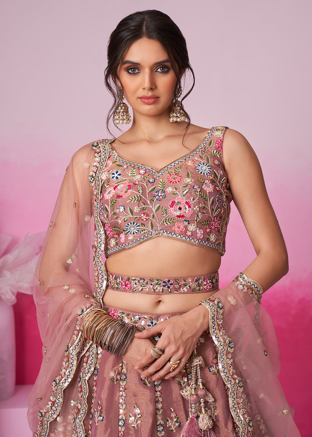 Buy Now Rose Gold Net Ethnic Embroidered Bridal Wear Lehenga Choli Online in USA, UK, Canada & Worldwide at Empress Clothing. 