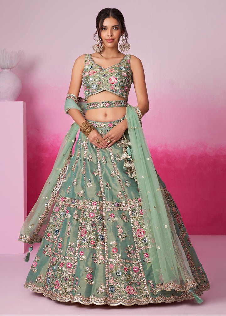 Buy Now Sea Green Net Ethnic Embroidered Bridal Wear Lehenga Choli Online in USA, UK, Canada & Worldwide at Empress Clothing.