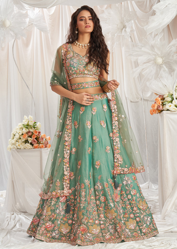 Buy Now Green Organza Multi Sequinned Wedding Lehenga Choli Online in USA, UK, Canada, UAE, France, Germany & Worldwide at Empress Clothing.