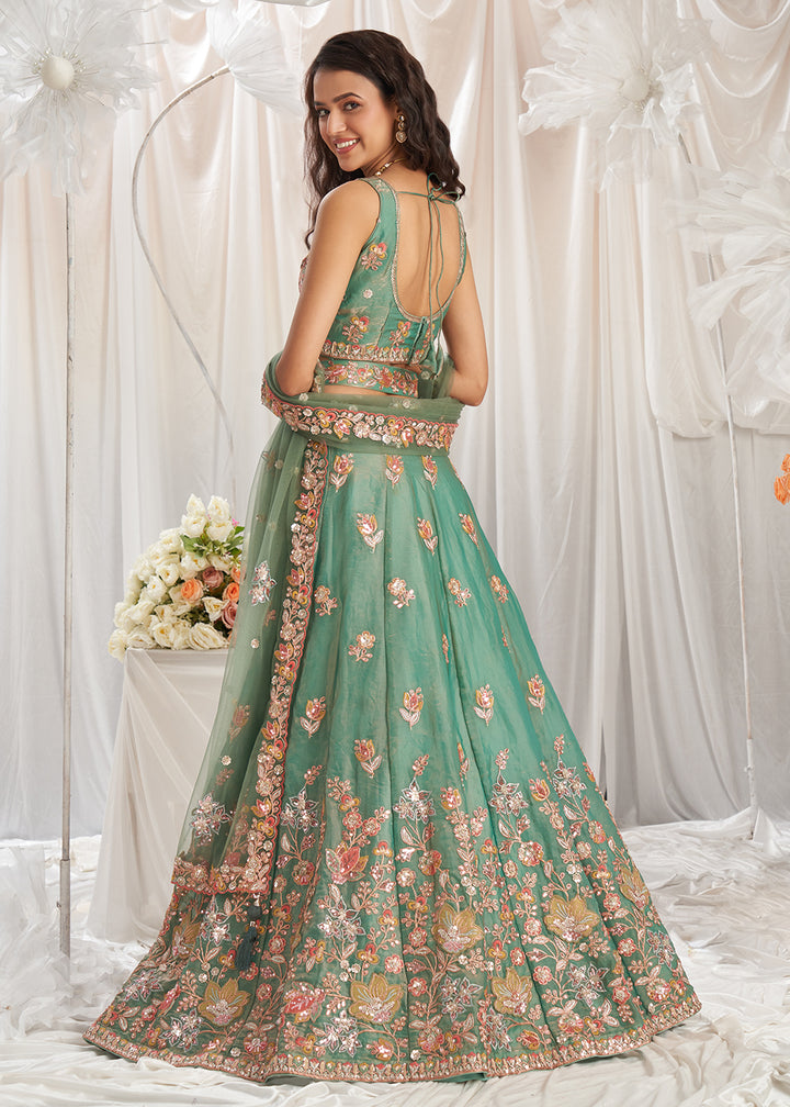 Buy Now Green Organza Multi Sequinned Wedding Lehenga Choli Online in USA, UK, Canada, UAE, France, Germany & Worldwide at Empress Clothing.