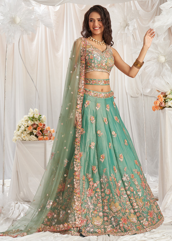 Buy Now Green Organza Multi Sequinned Wedding Lehenga Choli Online in USA, UK, Canada, UAE, France, Germany & Worldwide at Empress Clothing.