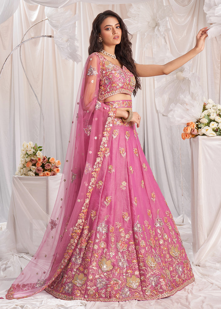 Buy Now Pink Organza Multi Sequinned Wedding Lehenga Choli Online in USA, UK, Canada, UAE, France, Germany & Worldwide at Empress Clothing. 