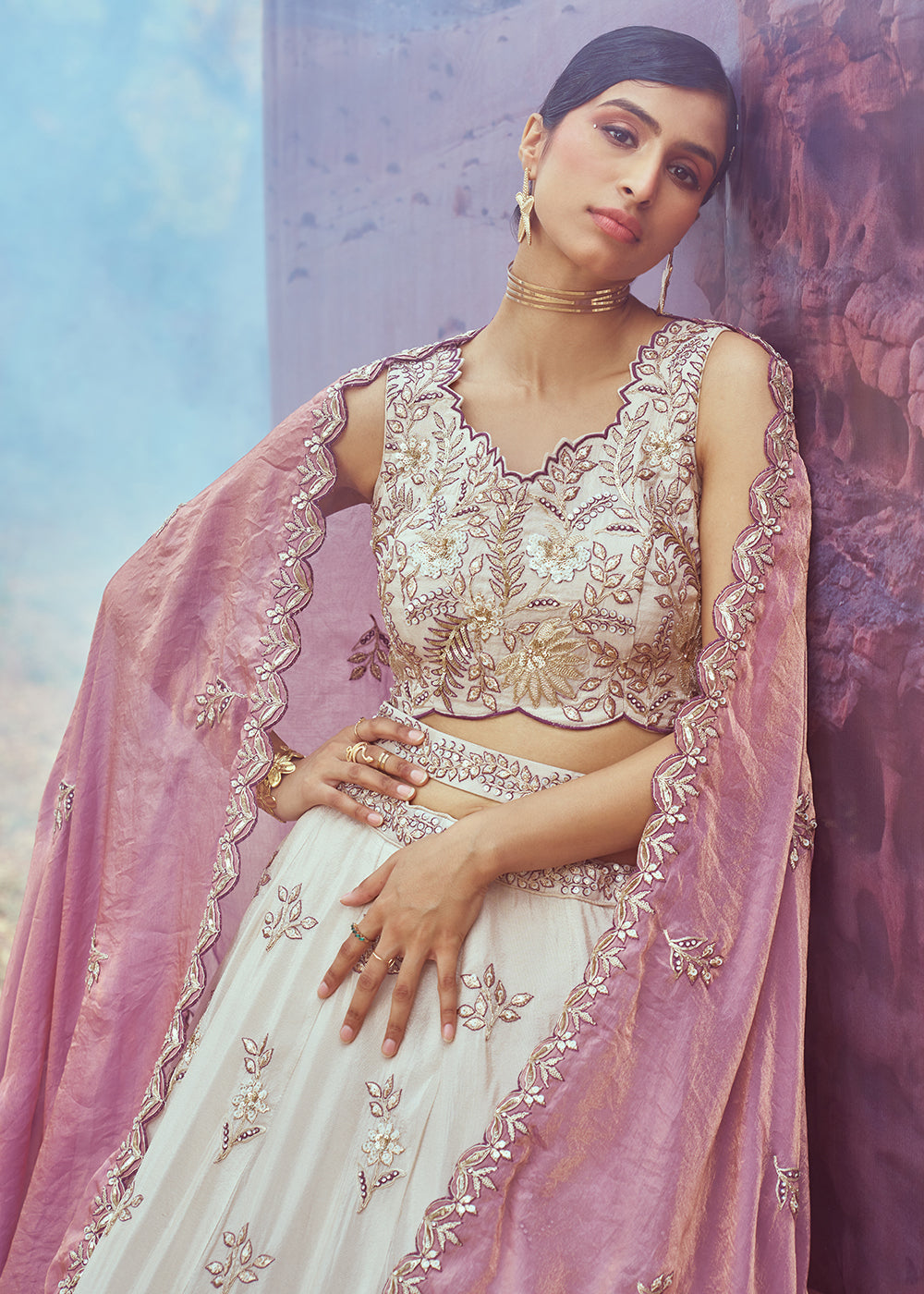 Buy Now Cream & Purple Viscose Embroidered Designer Lehenga Choli Online in USA, UK, Canada, UAE, France, Germany & Worldwide at Empress Clothing. 