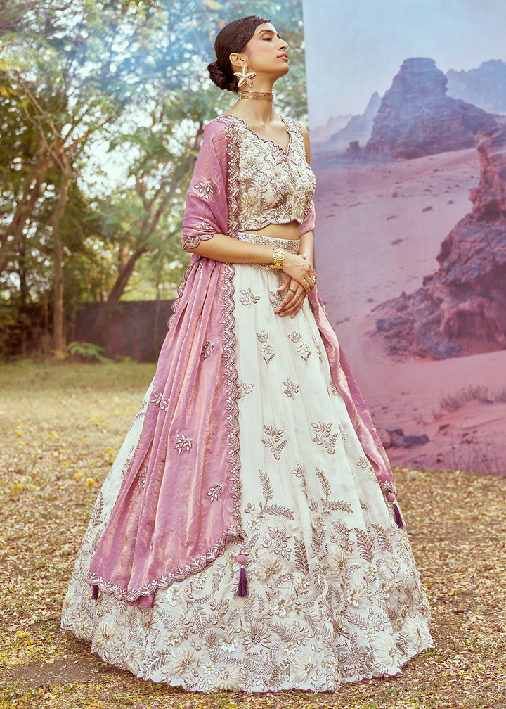 Buy Now Cream & Purple Viscose Embroidered Designer Lehenga Choli Online in USA, UK, Canada, UAE, France, Germany & Worldwide at Empress Clothing. 