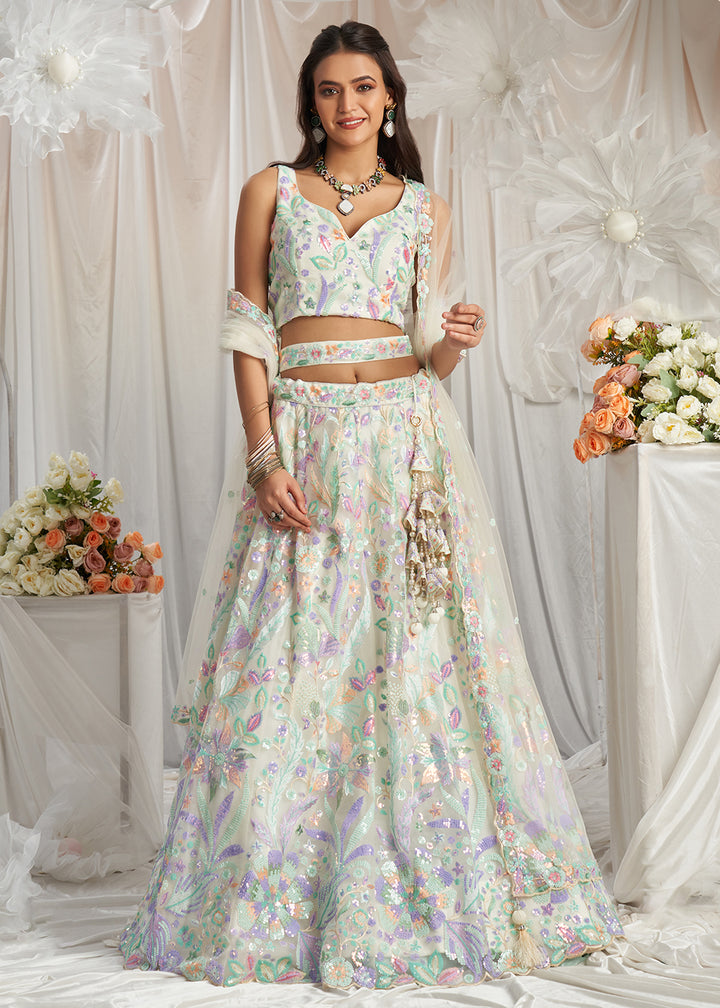 Buy Now Cream Net Floral Embroidered Designer Lehenga Choli Online in USA, UK, Canada, UAE, France, Germany & Worldwide at Empress Clothing.