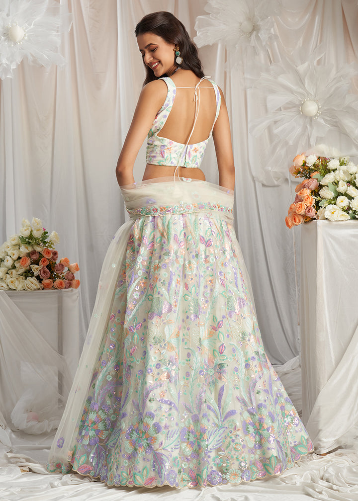 Buy Now Cream Net Floral Embroidered Designer Lehenga Choli Online in USA, UK, Canada, UAE, France, Germany & Worldwide at Empress Clothing.