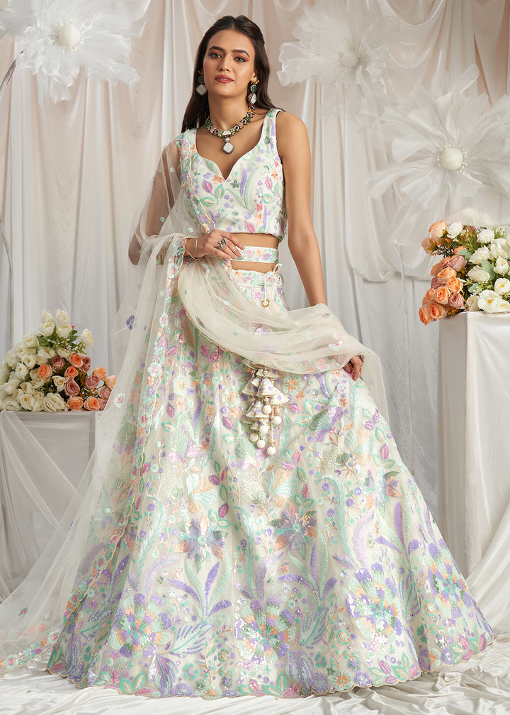 Buy Now Cream Net Floral Embroidered Designer Lehenga Choli Online in USA, UK, Canada, UAE, France, Germany & Worldwide at Empress Clothing.