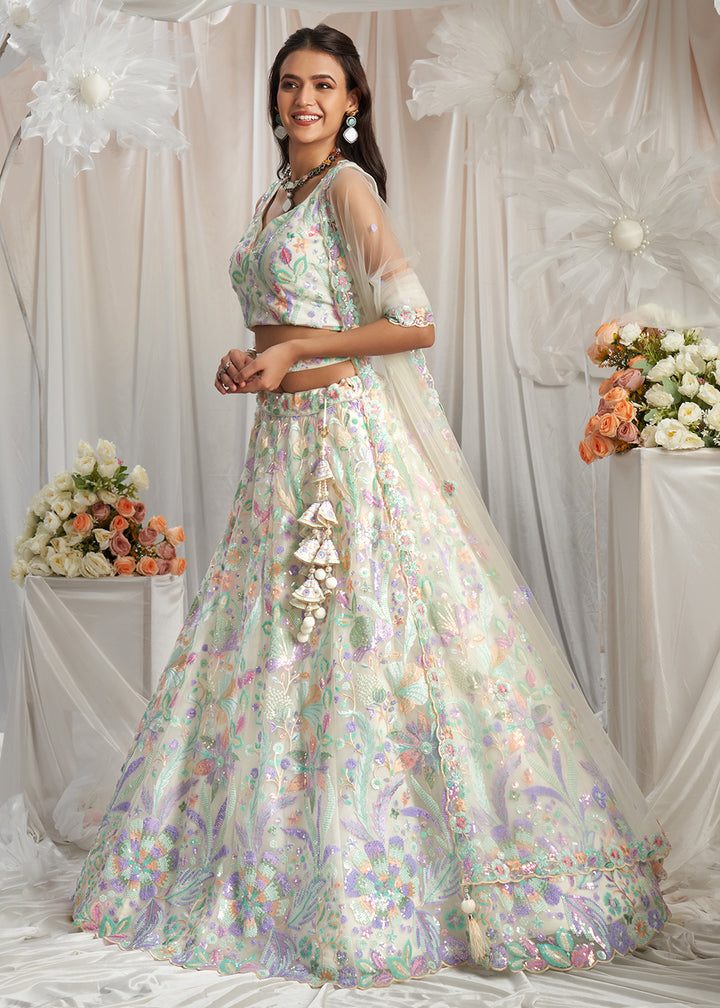 Buy Now Cream Net Floral Embroidered Designer Lehenga Choli Online in USA, UK, Canada, UAE, France, Germany & Worldwide at Empress Clothing.